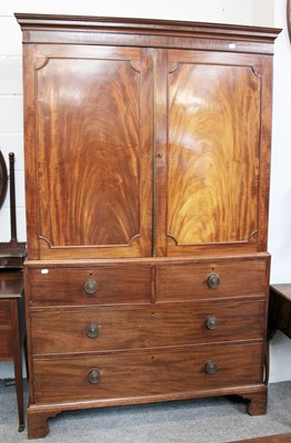 Lot 1222 - A George III Mahogany Linen Press, fitted for...