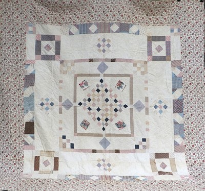 Lot 2032 - 19th Century Patchwork Quilt, with a central...
