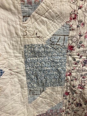 Lot 2032 - 19th Century Patchwork Quilt, with a central...