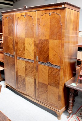 Lot 1318 - A Mahogany Triple Wardrobe with Carved...