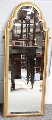 Lot 1321 - A Gilt-Framed Arch Top Mirror, with beveled...