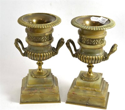 Lot 189 - A pair of brass and onyx campana shaped vases