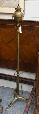 Lot 1131 - An Art Nouveau Brass Oil Lamp and Stand, with...