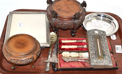 Lot 198 - Tray of two silver photograph frames, a Christophle dish, silver thermometer, kris paper knife,...