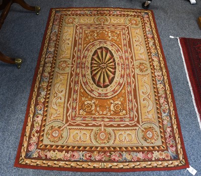 Lot 1215 - Aubusson design Rug The field with central...