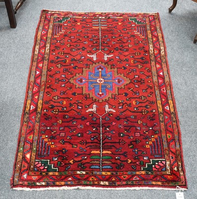 Lot 1288 - Hamadan Rug The brick red field of vines...