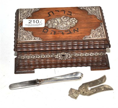 Lot 210 - A Russian Brit Mila Maohul hardwood box with white metal mounts containing a circumcision clip...