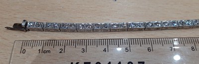 Lot 2320 - A Diamond Line Bracelet comprising of...