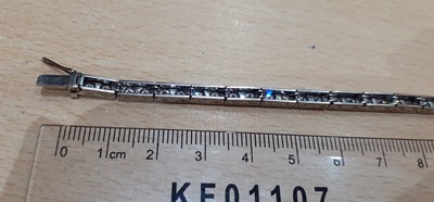 Lot 2320 - A Diamond Line Bracelet comprising of...