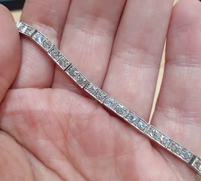 Lot 2320 - A Diamond Line Bracelet comprising of...