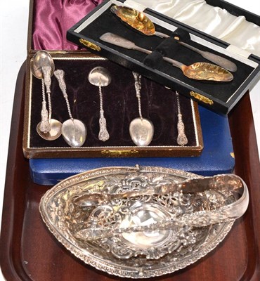 Lot 213 - A set of six cake forks, coffee spoons, pair of berry spoons (cased), two baskets and tongs