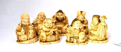 Lot 241 - A Set of Japanese Ivory Okimonos of the Seven Gods of Good Fortune, Meiji period, each figure...