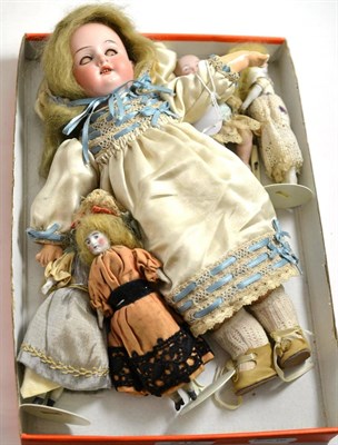 Lot 215 - Armand Marseille 390 bisque socket head doll with blond wig, composition body, wearing a cream silk