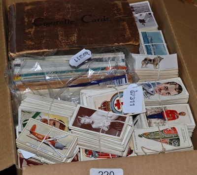 Lot 220 - A box of various cigarette cards, postcards etc