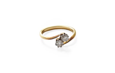 Lot 80 - A Diamond Two Stone Twist Ring, the old cut...