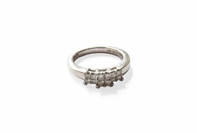 Lot 89 - A Diamond Cluster Ring, stamped 'Pt950', total...