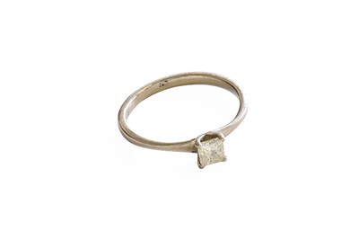 Lot 1036 - A Palladium Diamond Solitaire Ring, the...