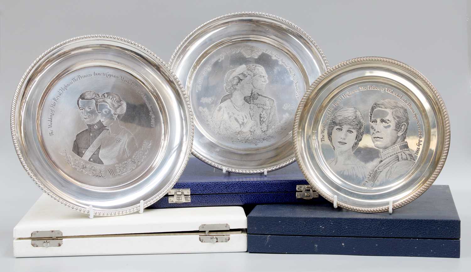 Lot 78 - Three Elizabeth II Silver Commemorative Plates,...