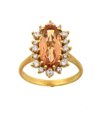 Lot 2194 - An 18 Carat Gold Topaz and Diamond Cluster...