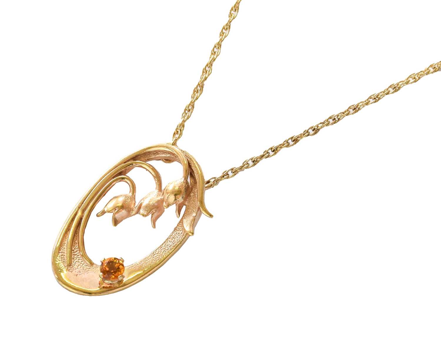 Lot 11 - A 9 Carat Gold Lily of the Valley Pendant on