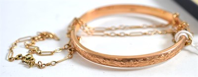 Lot 238 - A 9ct rose gold bangle and a chain marked ";9ct"