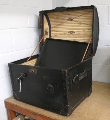 Lot 384 - A Black Leather Mounted Domed Trunk with a...