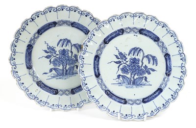 Lot 113 - A Pair of English Delft Plates, 18th century,...