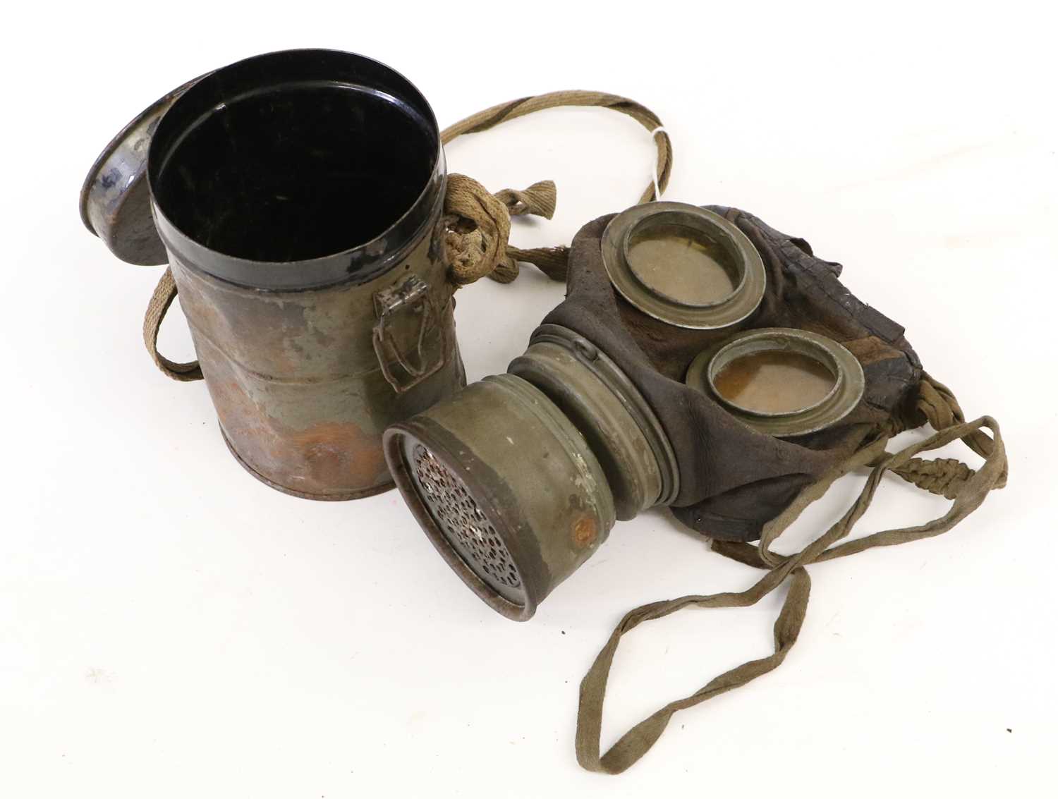 Lot 60 - A First World War German Leather Gas Mask,...