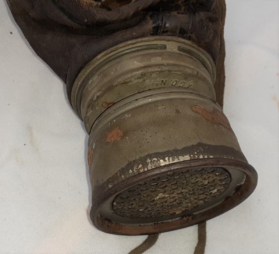 Lot 60 - A First World War German Leather Gas Mask,...