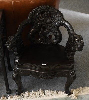 Lot 1260 - An Oriental Carved Hardwood Arnchair, with...