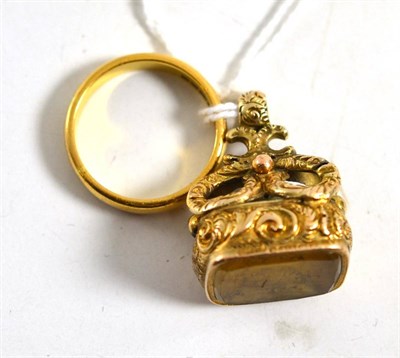 Lot 281 - A 9ct gold and hardstone Regency fob and a 22ct gold wedding band