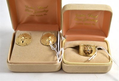 Lot 286 - A Sanibel Island, Florida gold and diamond set ring and similar pair of earrings