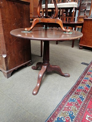 Lot 1197 - A George III Oak Tilt Top Tripod Table, with...