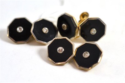 Lot 292 - A cufflink and earring set (converted) set with diamond and onyx