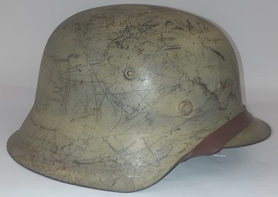 Lot 96 - A Second World War German M42 Heer Helmet,...