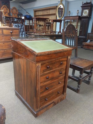 Lot 1160 - A Victorian Rosewood Davenport, with pirced...