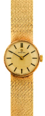 Lot 2310 - Omega: A Lady's 9 Carat Gold Wristwatch,...