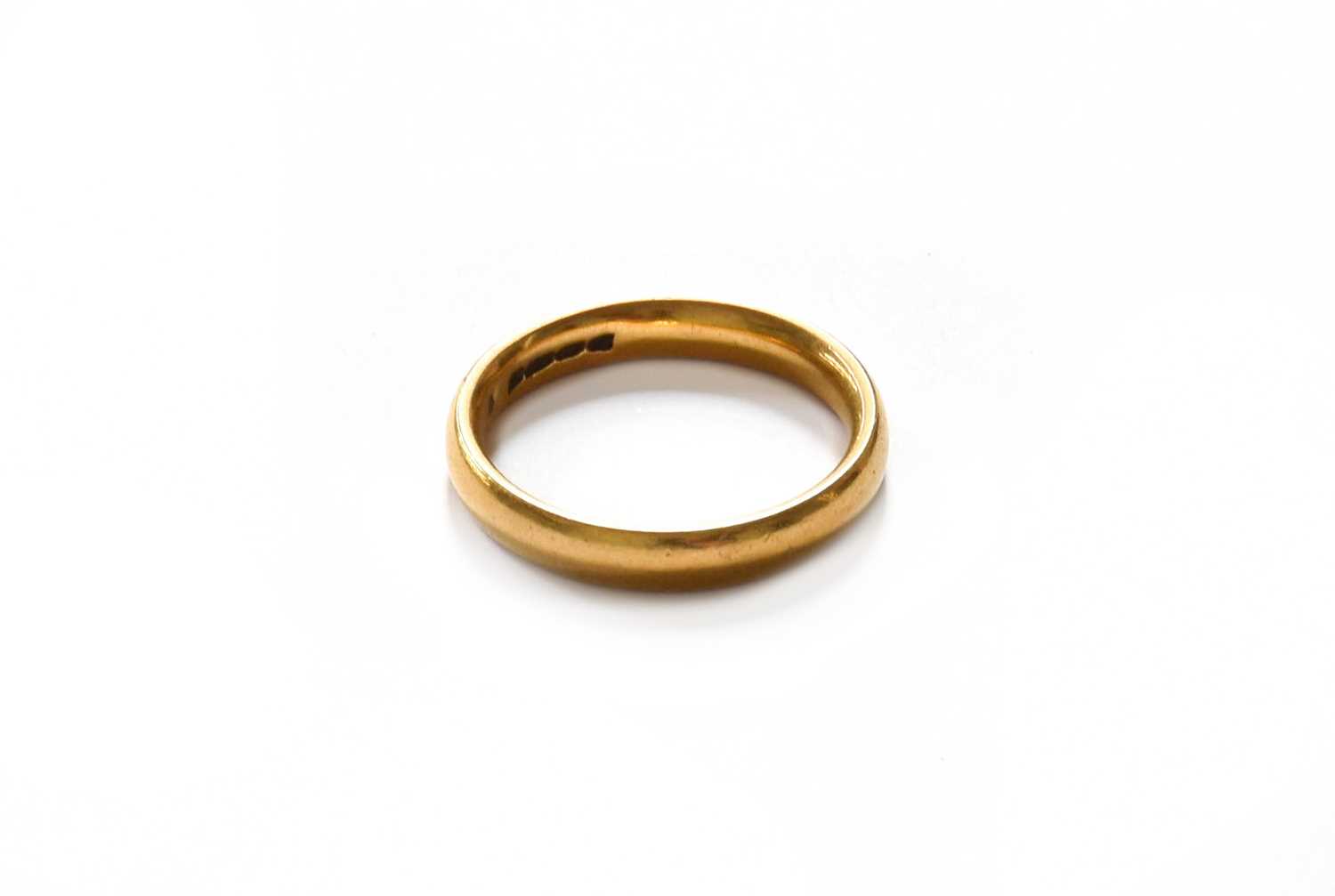 Lot 96 - A 22 Carat Gold Band Ring, finger size O