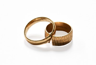 Lot 101 - Two 9 Carat Gold Band Rings, finger size U1/2,...