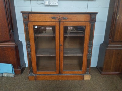 Lot 1118 - A 19th century Glazed Oak Bookcase, with a...