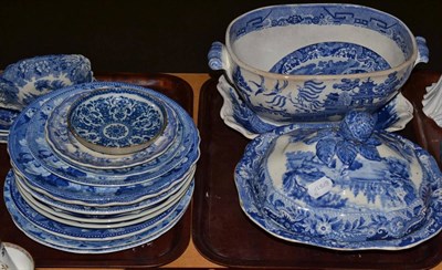 Lot 332 - Two trays of 19th century blue and white ceramics including tureen and cover, soup plates and...