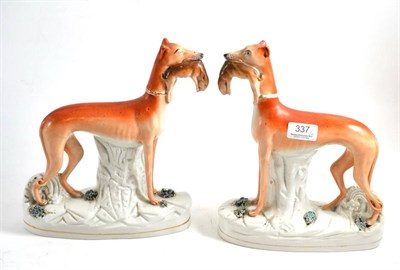 Lot 337 - Pair of pottery greyhounds