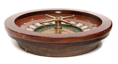 Lot 946 - A French Mahogany and Brass Roulette Wheel, by...