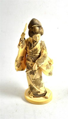 Lot 340 - A Japanese elephant ivory figure of a Geisha, circa 1900