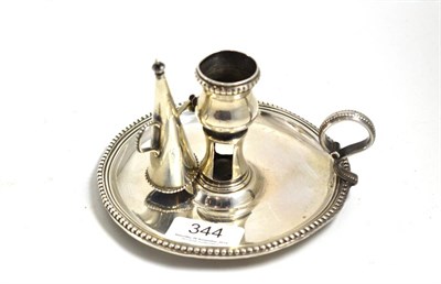 Lot 344 - A George III silver chamberstick with snuffer, London 1780, maker's mark WA