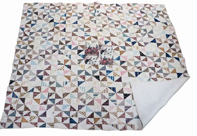 Lot 2035 - A 19th Century Patchwork Quilt, with a central...