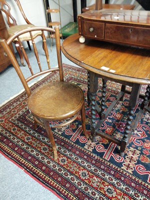 Lot 1262 - A 1920s Oak Drop Leaf Table, 100cm by 76cm by...