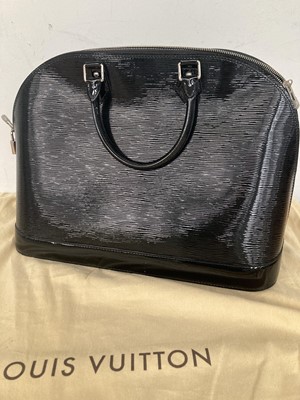 Lot 1048 - A Large Louis Vuitton Black Patent Epi Leather...