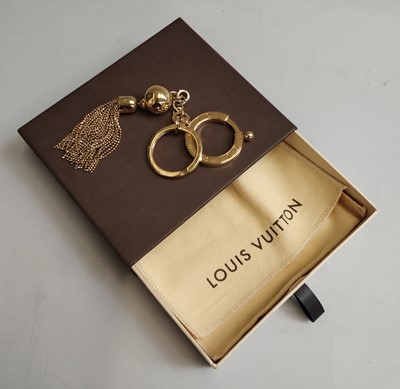 Lot 1032 - Louis Vuitton Gilt Metal Glitter Ball Key...