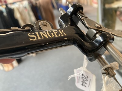 Lot 2044 - Miniature Singer Sewing Machine, with three...